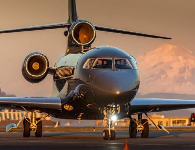 A sleek Dassault Falcon taxiing into the Shell apron at Victoria International Airport at sunset. Tagged on Instagram by @burtonader