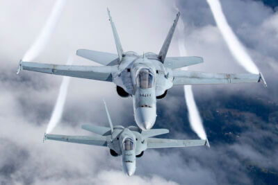 Air to air with two RCAF CF-188 Hornets during the 2023 Abbotsford International Airshow. Photo by Aviation PhotoCrew