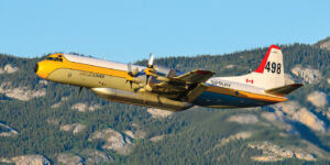 Since it was founded in 1967, Air Spray has provided air tanker and air attack aircraft to fight wildfires that threaten communities and forests. Here, a Lockheed L-188 Electra takes off out of Whitehorse, Yukon. Simon Blakesley Photo