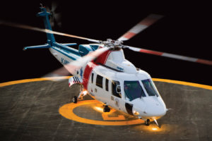 Helicopter rests on helipad